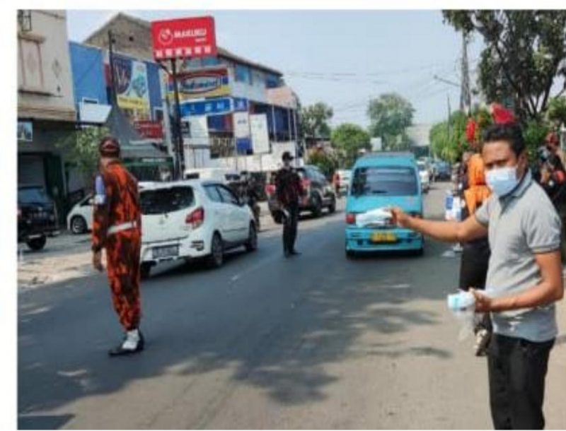 PEMUDA PANCASILA RANTING MEKARSARI TANGERANG KOTA MELAKUKAN AKSI PEDULI COVID-19