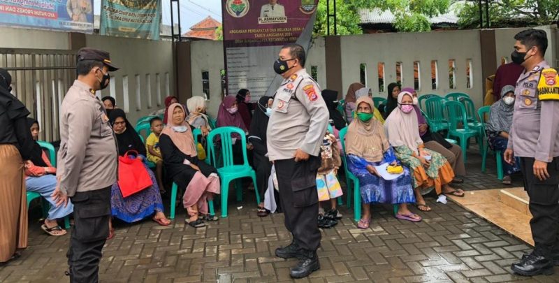 Polsek Pasar Kemis Polresta Tangerang Buka Gerai Vaksin Booster Pada saat Pengamanan Pembagian BNPT